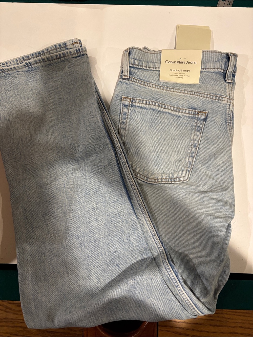 Calvin Klein Light Wash Denim Jeans with Tan Leather Patch - Picture 4 of 10